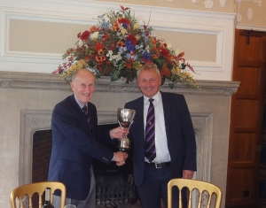 Roger Rawson receiving the masters cup