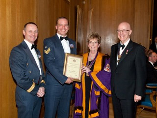 Flt Sgt Woodward of RAF 606 Squadron, receiving his Award from the Master and Sponsor, Past Master Rod Bennion