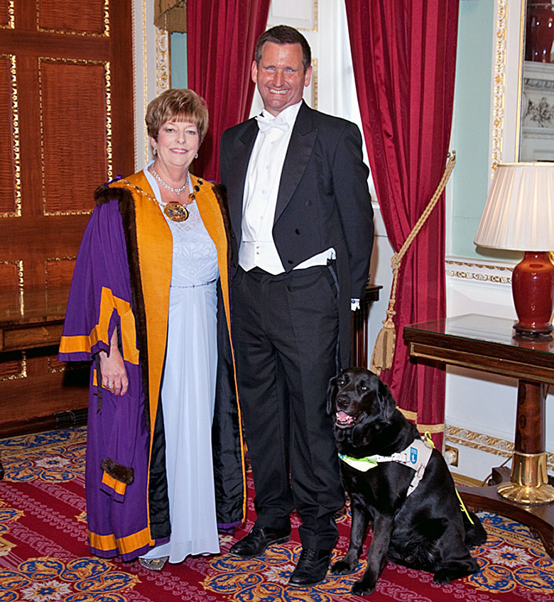 The Master, Barbara Harding, with Lord Holmes and his guide dog Lottie